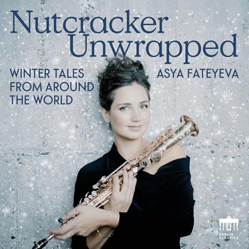 Asya Fateyeva holding a saxophone on the album cover “Nutcracker Unwrapped”.