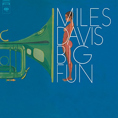 Album cover art showing a green trumpet and a standing woman on blue background.