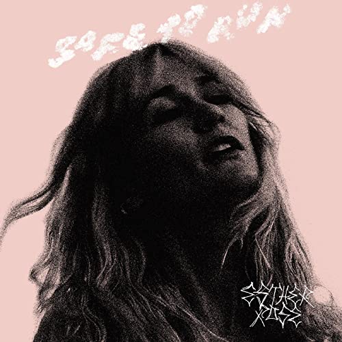 Black and white portrait of a woman with long hair, album artwork.