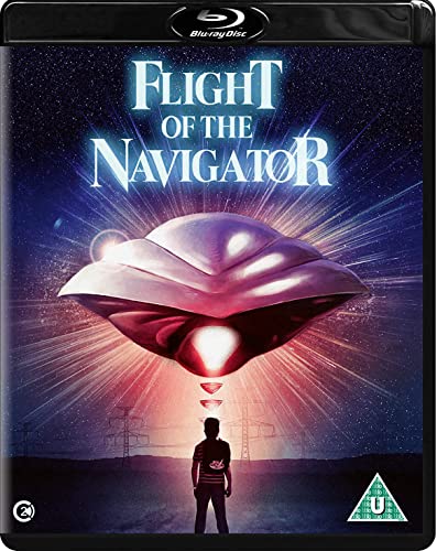 A boy stands beneath a glowing spaceship in this Flight of the Navigator Blu-ray cover.