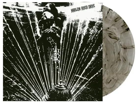 Vinyl record cover with a black and white portrait and marbled disc.