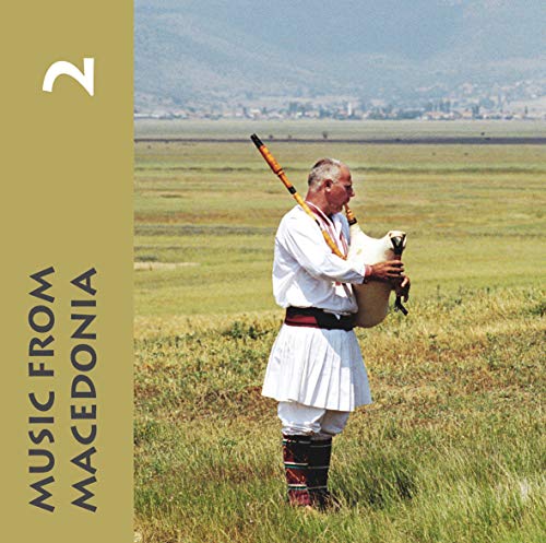 CD cover: man playing a traditional Macedonian wind instrument in a field.