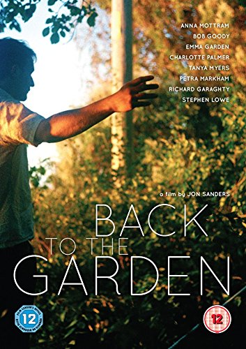 A man reaches out in a garden on the Back to the Garden DVD cover.