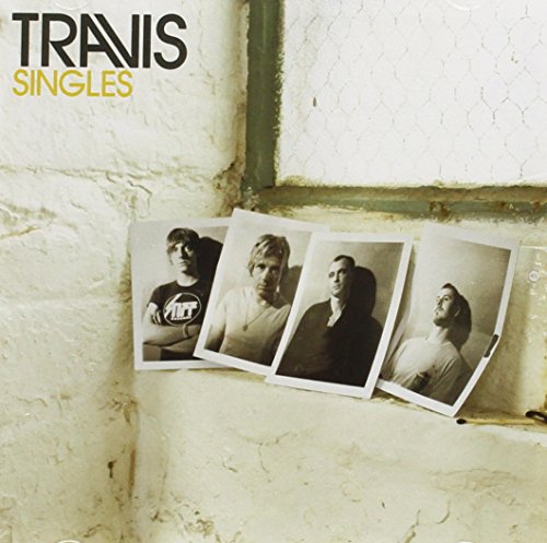 Travis “Singles” CD cover with band photos on a textured wall.