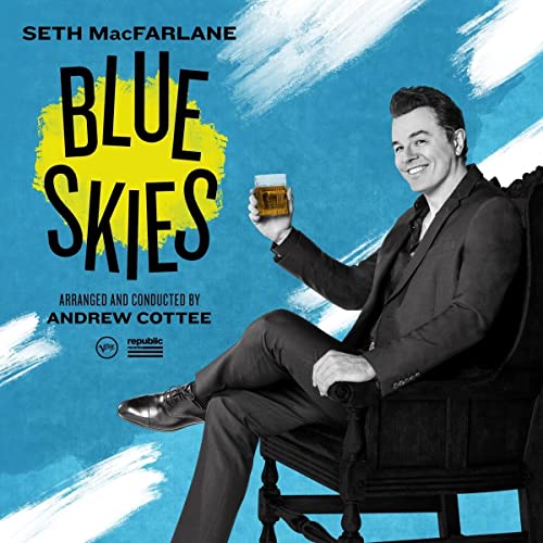 Seth MacFarlane in a suit sits with a drink, album cover art.