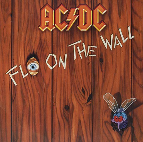 Vinyl record with AC/DC album cover art, likely featuring band members or iconic imagery.