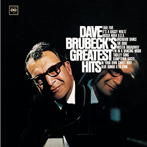 Dave Brubeck's "Greatest Hits" CD cover with a portrait of the pianist.