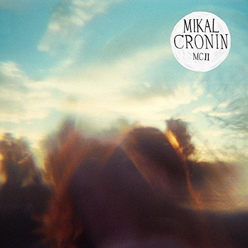 Mikal Cronin “MCII” album cover with blurred landscape and sky.