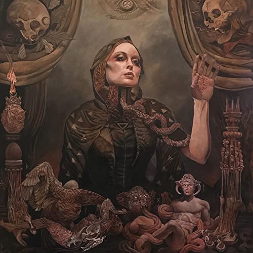 Painted album cover featuring a woman with snakes and symbolic imagery.