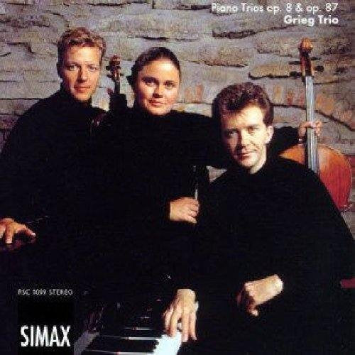 CD cover featuring three musicians with piano, cello, and violin.