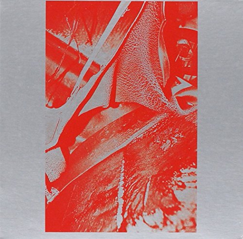 Red and white abstract shapes on the cover of a CD.