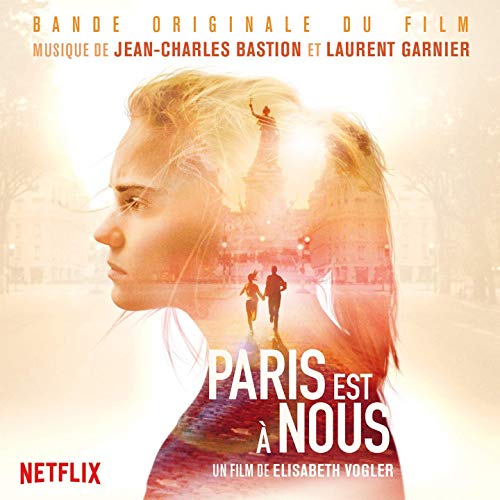 Vinyl record cover featuring a woman’s face and Parisian street scene.