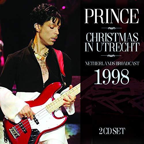 Prince playing a red bass guitar on the "Christmas In Utrecht" CD cover.