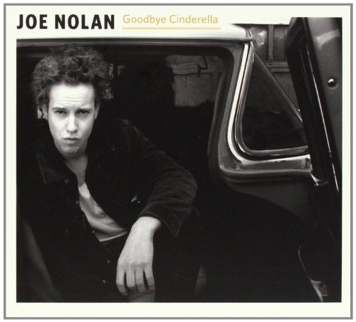 Black and white CD cover featuring a young man inside a car.