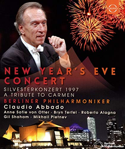 Claudio Abbado conducting with fireworks and a concert hall backdrop.