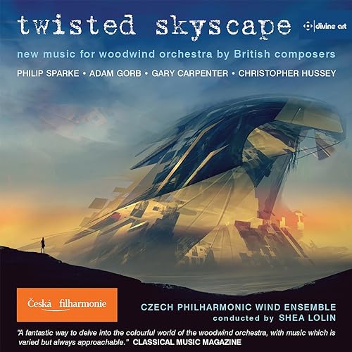 CD cover: abstract, fractured architecture against a blue and golden sky.