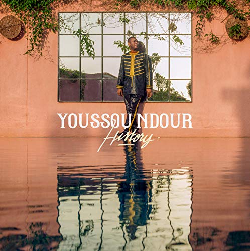 Youssou Ndour album cover, featuring the artist reflected in water.
