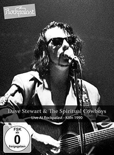 Dave Stewart performing live with a guitar, black and white image.
