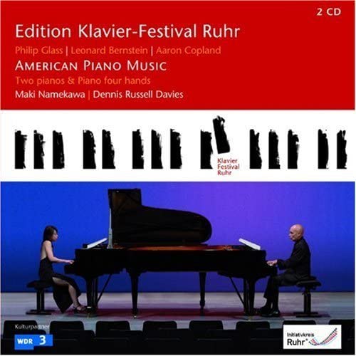 DVD cover for "Soumaya" featuring two pianists at grand pianos.