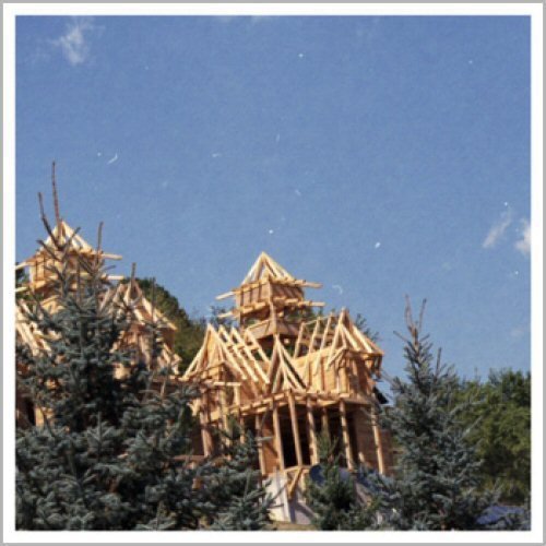 CD cover art: unfinished wooden structure against a blue sky.