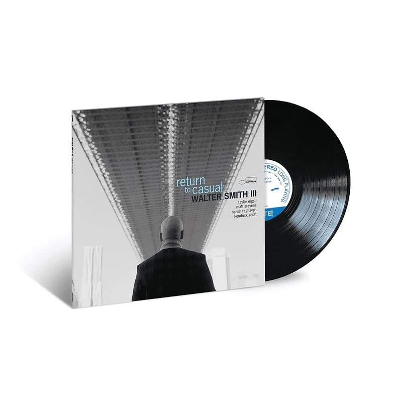 Vinyl record of Walter Smith III’s “return to casual” album, blue cover.