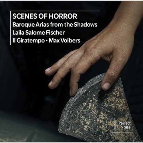 CD cover with hand touching a textured stone, dark background.