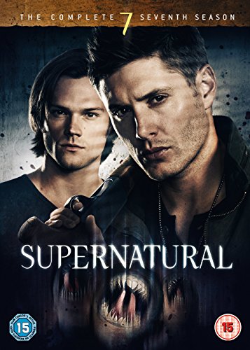 Supernatural season seven DVD cover with two men and a monster's face.