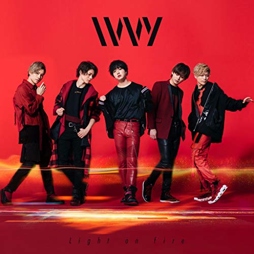 Ivvy band members in dark clothing against a red background.
