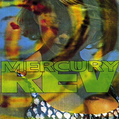 Album cover for Mercury Rev’s “Yerself Is Steam” with blurred portrait and green text.