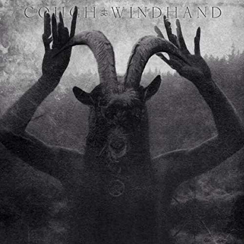 Dark album cover featuring a horned, shadowy figure with outstretched hands.