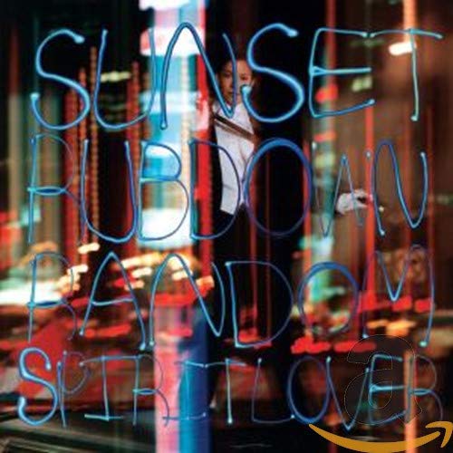 CD cover with blue neon lettering and a blurred figure.