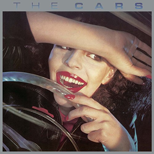 The Cars album cover featuring a woman with red lips and reflective sunglasses.