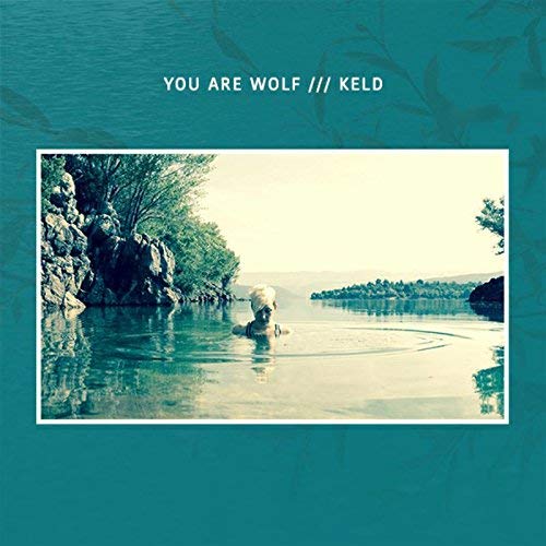 CD cover: person swimming in clear water, landscape background.