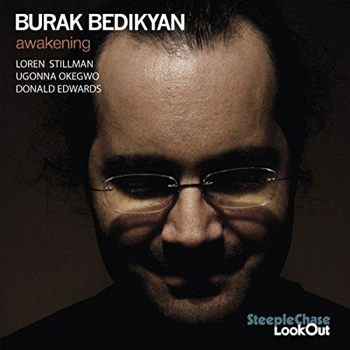 CD cover featuring a close-up portrait of Burak Bedikyan wearing glasses.