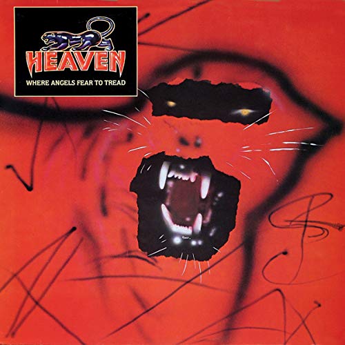 Red album cover with a snarling tiger face and band logo.