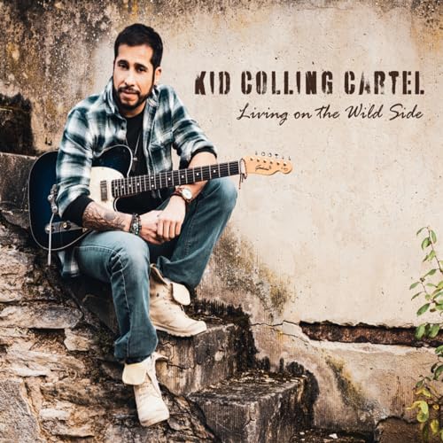 Man with guitar sitting on stone steps, album cover art.