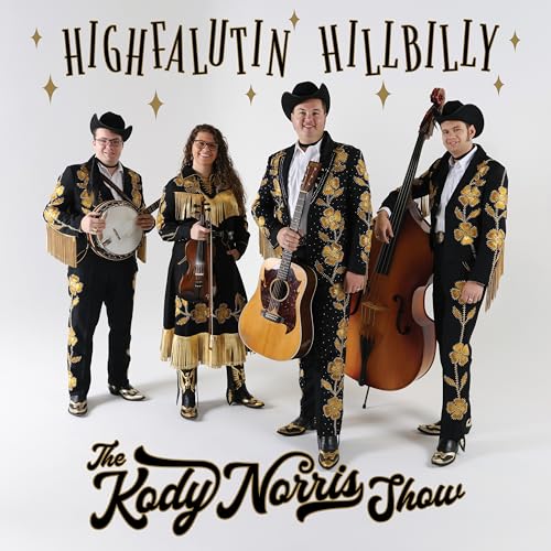 Four musicians in ornate suits with banjo, fiddle, guitar, and bass.