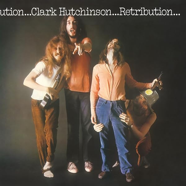 Album cover featuring four men with long hair in 1970s attire.