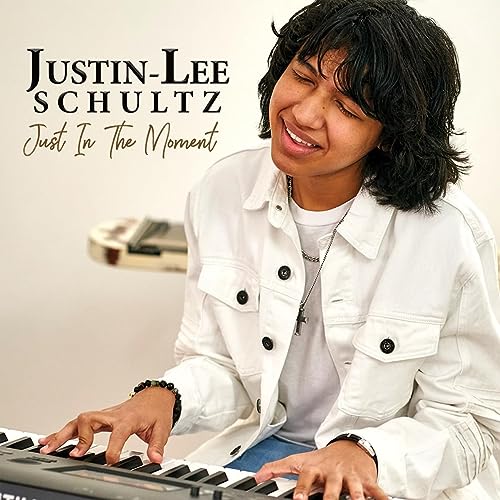 Justin-Lee Schultz album cover: smiling man playing a keyboard.