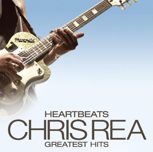 Chris Rea album cover featuring a guitarist playing a gold guitar.