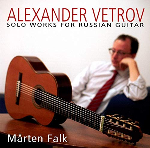 CD cover featuring a guitarist and a classical guitar.