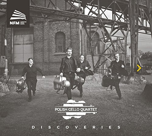 Four cellists with instruments walking towards camera in front of a building.