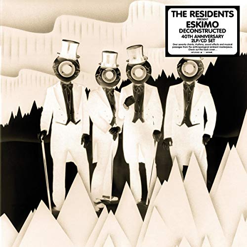 Black and white album cover featuring four figures in suits and top hats.