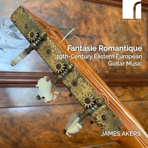 Close-up of an antique guitar headstock with album title overlay.