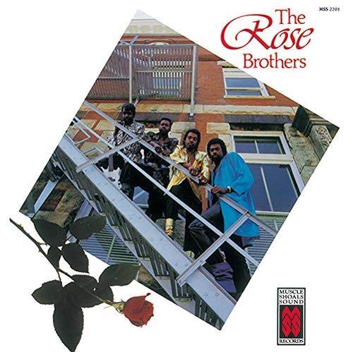 Album cover for The Rose Brothers, featuring four men on stairs.