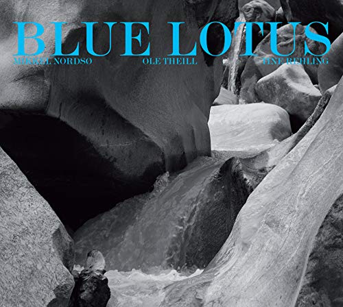CD cover: grayscale image of a rocky waterfall and the title “Blue Lotus”.