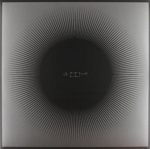 Black vinyl record cover with radiating lines and central glyphs.