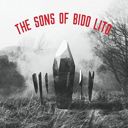 Black and white album cover with crystal formations in a misty field.