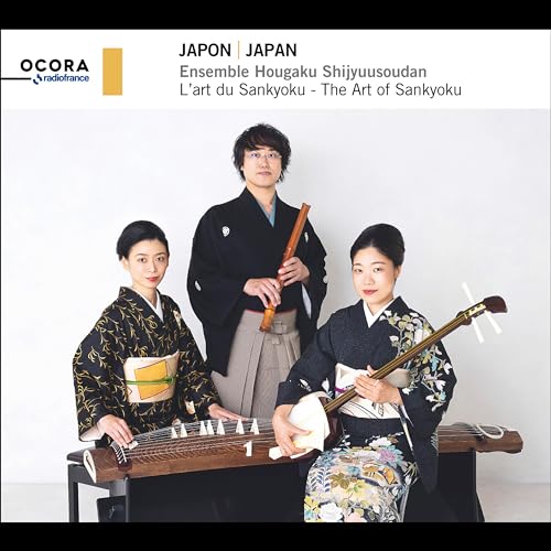 Japanese musicians in traditional dress with shamisen, shakuhachi, and koto.