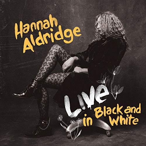 Hannah Aldridge album cover, black and white photo of a seated woman.